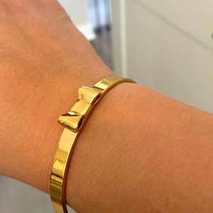Gold bow Kate spade bangle bracelet